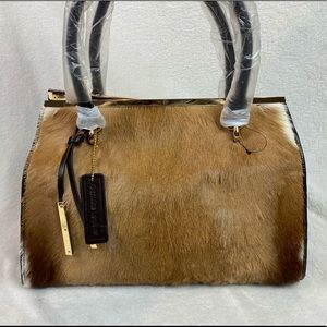 NWOT Wilson’s Leather Bag with Detachable Strap